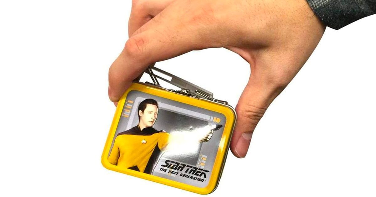 An image of a person holding the mini lunchbox.