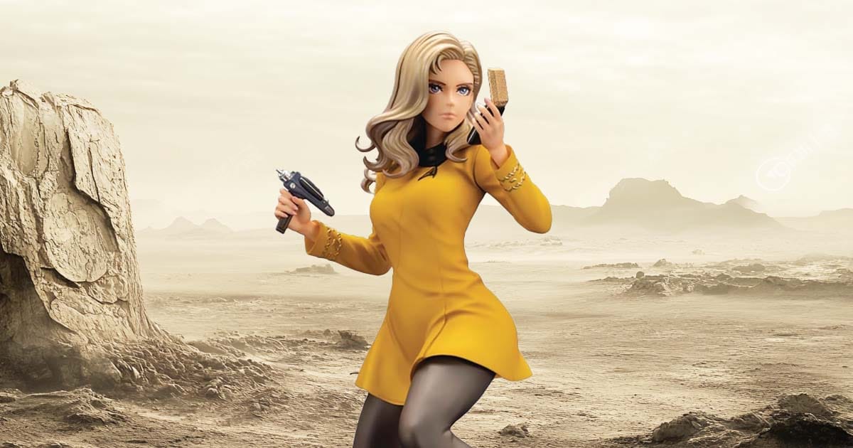 The female Star Trek officer statue against an alien landscape.