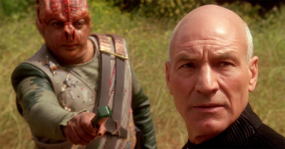 A screen capture showing the two captains on the planet in the episode Darmok.