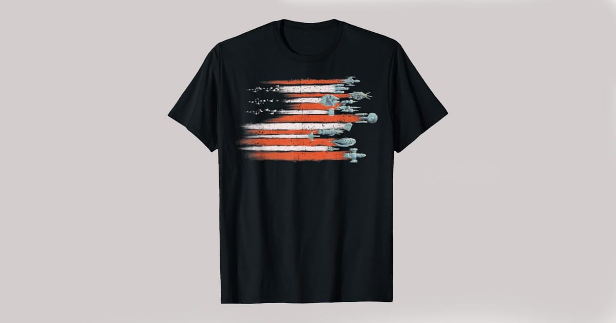 Image of a T-shirt that has an American Flag with science fiction space ships.