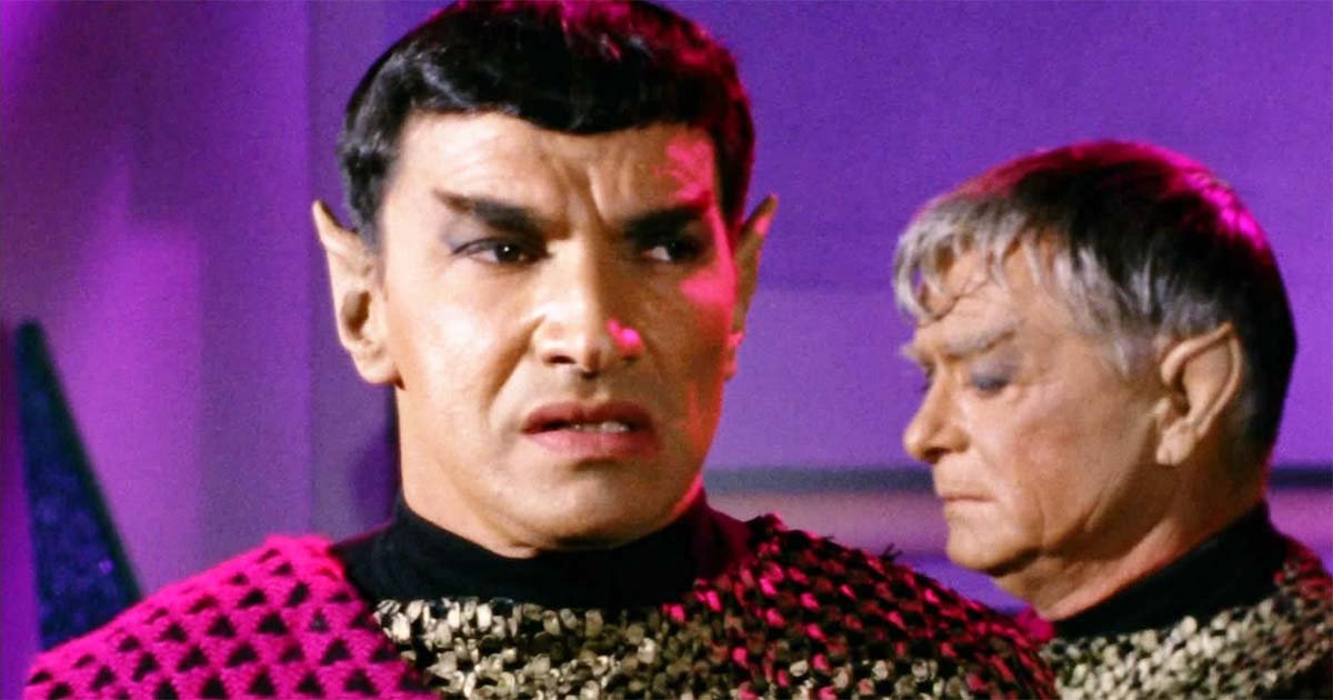 Mark Lenard as the Romulan Commander in "Balance of Terror," wearing a distinctive Romulan uniform with a solemn, strategic expression.