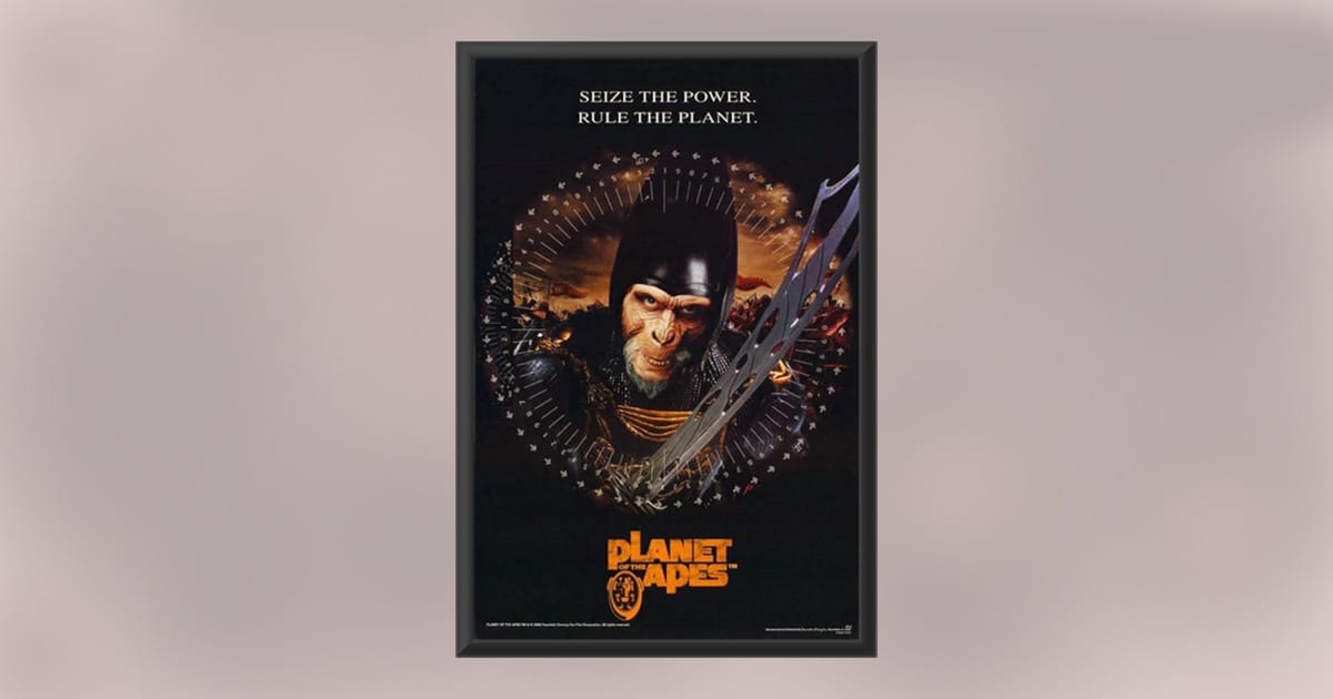 Framed "Planet of the Apes" movie poster with a fierce ape warrior, dramatic background, and the tagline "Seize the Power. Rule the Planet."