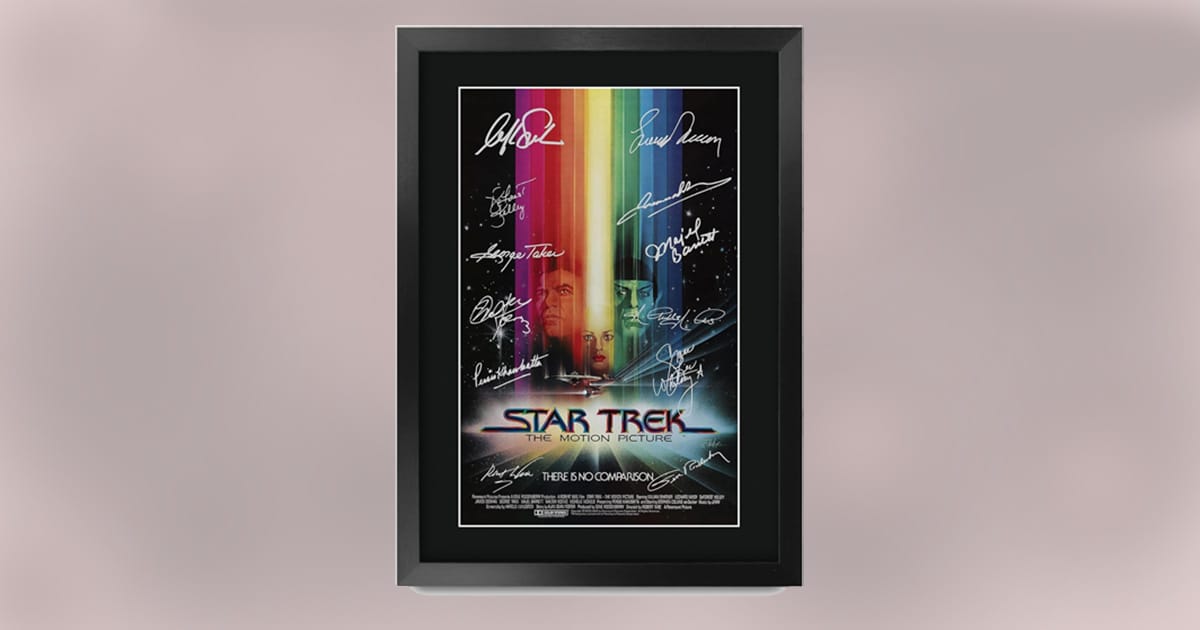 Framed Star Trek: The Motion Picture poster with vibrant artwork and pre-printed cast autographs.