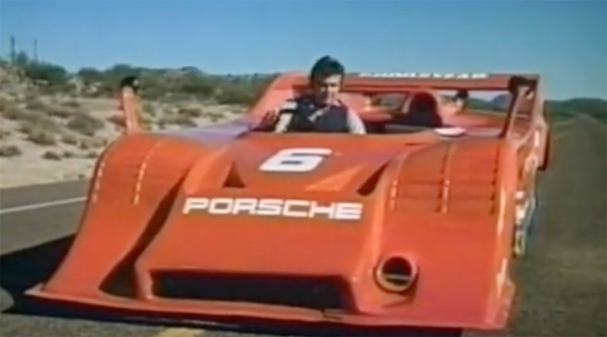 Lee Majors as Franklin Hart from the movie "The Last Chase" driving his Porsche Race car. 