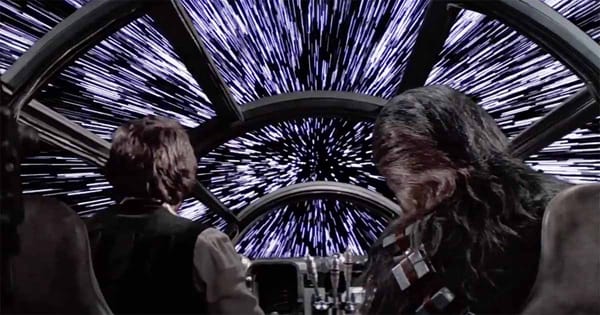 An image from the movie Star Wars IV: A New Hope. Han and Chewbacca flying Millennium Falcon.