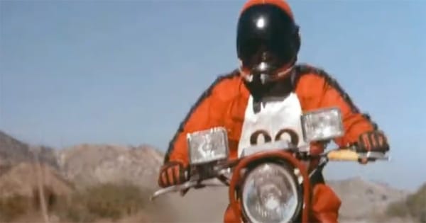 Fred Ward as Lyle Swann riding his dirt bike in the movie "Timerider: The Adventure of Lyle Swann"